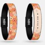 XOIN Bee Kind Premium Wristband with honeycomb and bee design