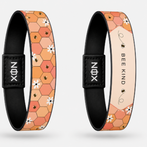 XOIN Bee Kind Premium Wristband with honeycomb and bee design