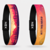 XOIN Hit The Road Premium Wristband featuring scenic sunset landscape and travel-inspired artwork