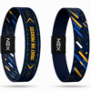 XOIN Trust The Process Premium Wristband featuring blue and gold motivational design