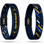 XOIN Trust The Process Premium Wristband featuring blue and gold motivational design
